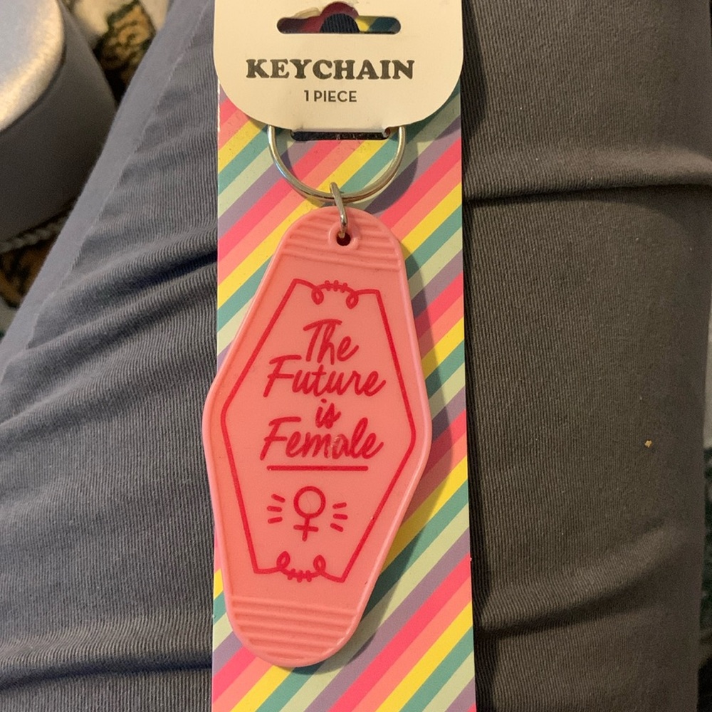 The color is pink and it says the future is female 🩵
